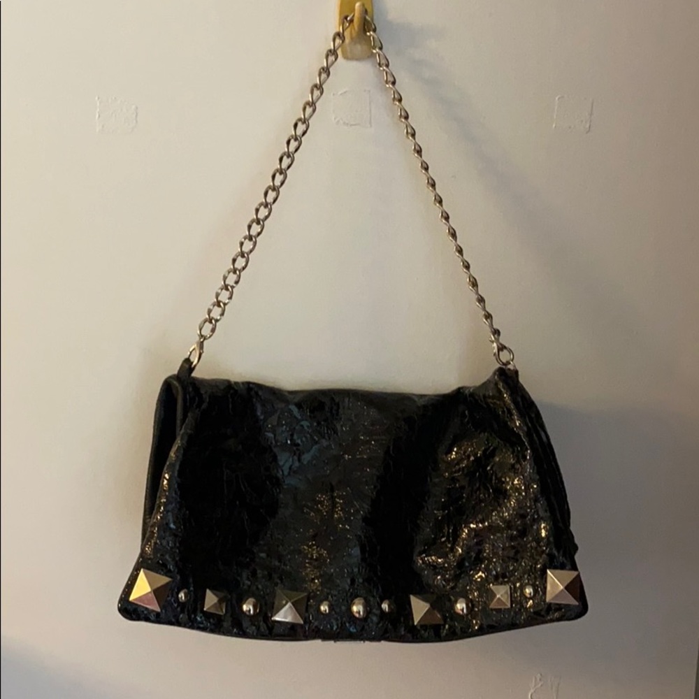 Reversible leather clutch
